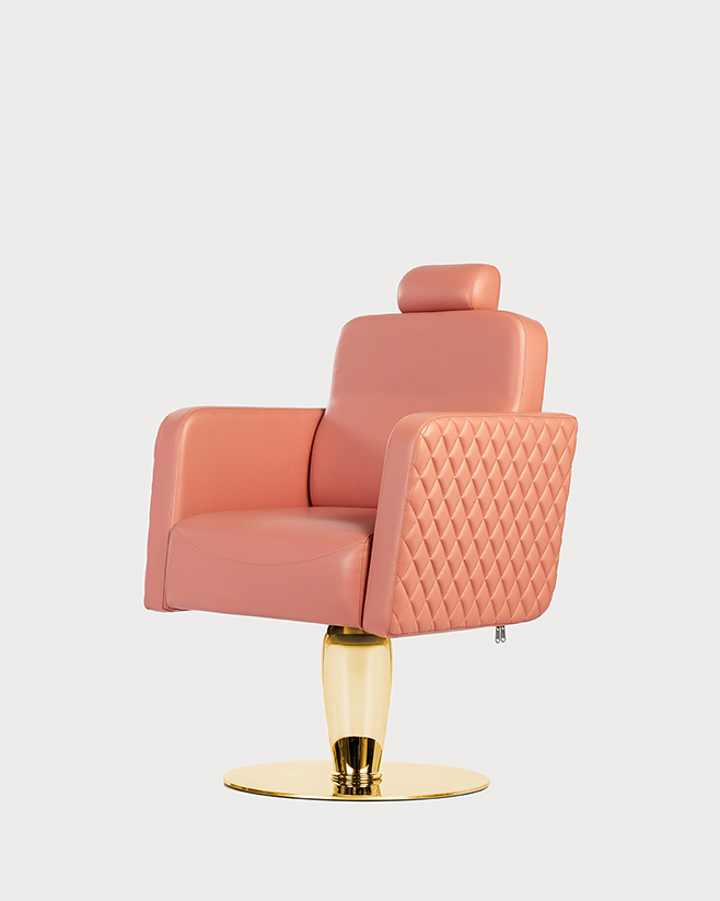 A professional pink all-purpose chair for salon use with a chrome base, adjustable seat height, and a reclining backrest.