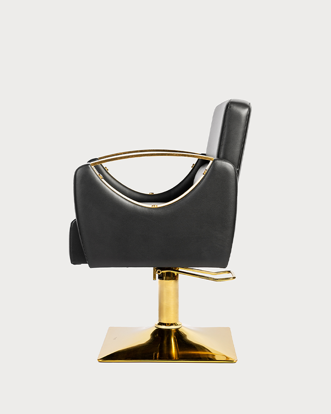 Side view of Black Rock salon chair showing reclining backrest chrome base and cushioned seat