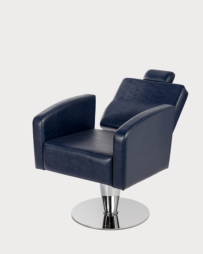 Side view of Monte salon chair showing reclining backrest cushioning and chrome base