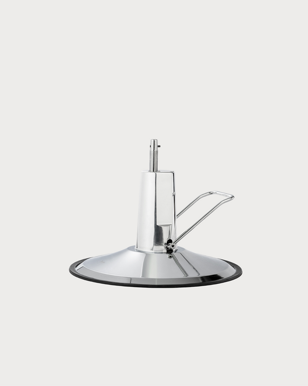 Silver salon chair hydraulic pump with cylindrical body and foot lever for smooth height adjustment
